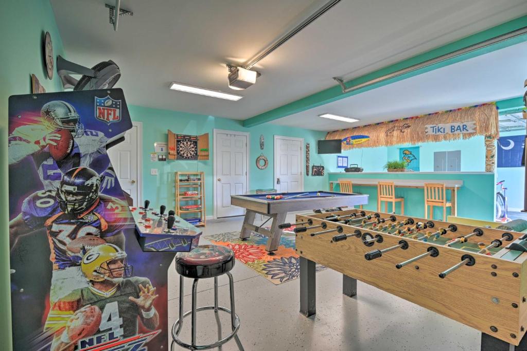 Game room with pool and tables